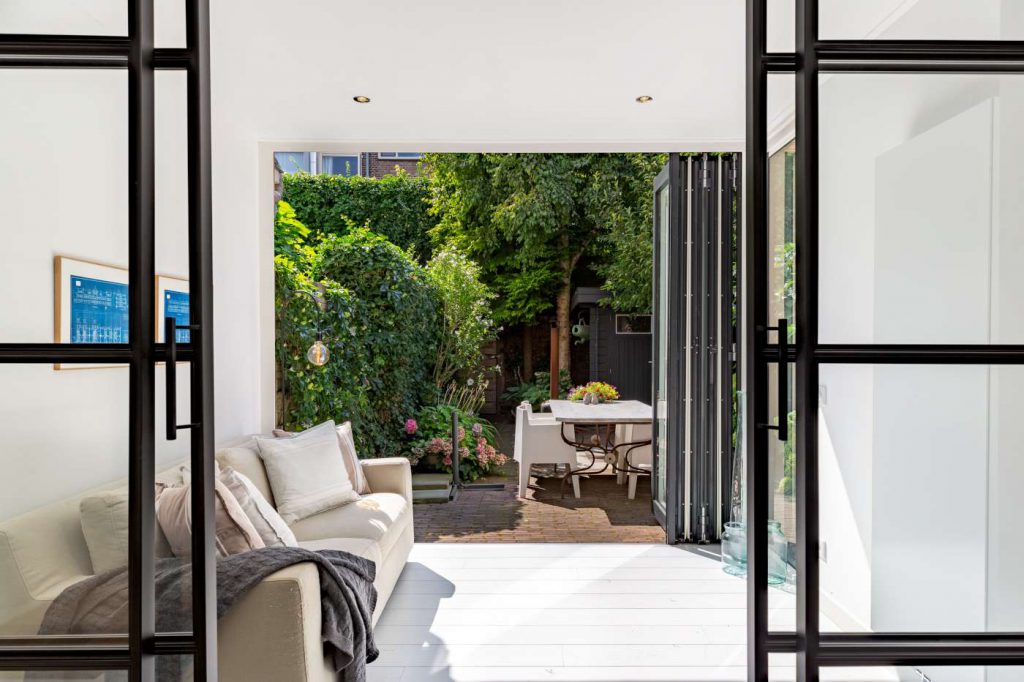 Serre aanbouw met vouwwand