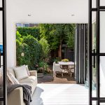 Serre aanbouw met vouwwand