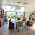 Serre aanbouw met vouwwand