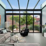 Serreaanbouw aan herenhuis in Amsterdam