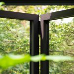 Doorkijkje donkergroene orangerie