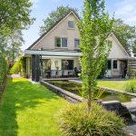 Geisoleerde serreaanbouw met vouwwand