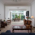 Plisségordijnen in het dak van de serre