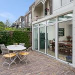 Plisségordijnen in het dak van de serre