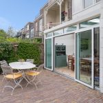 Plisségordijnen in het dak van de serre