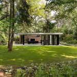 Glazen vouwwanden aan luxe tuinkamer in Hilversum