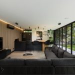 Glazen vouwwanden aan luxe tuinkamer in Hilversum