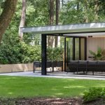 Glazen vouwwanden aan luxe tuinkamer in Hilversum