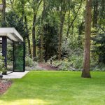 Glazen vouwwanden aan luxe tuinkamer in Hilversum