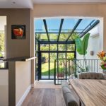 Serre met bovenlichten en vouwwand