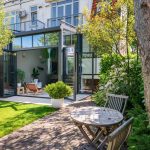 Serre met bovenlichten en vouwwand