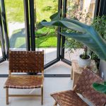 Serre met bovenlichten en vouwwand