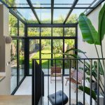 Serre met bovenlichten en vouwwand