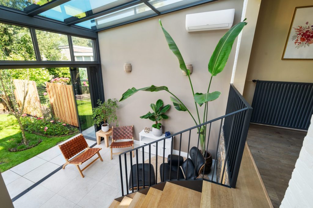 Glazen serre met vouwwand