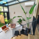 Serre met bovenlichten en vouwwand