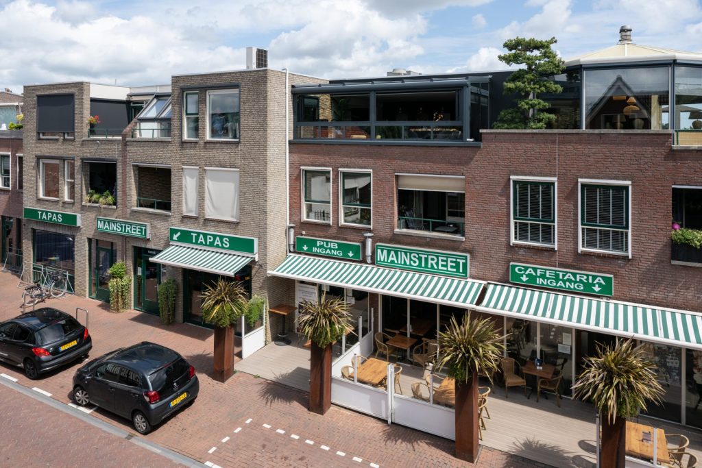 Inspirerende compacte serre op hoogte gerealiseerd